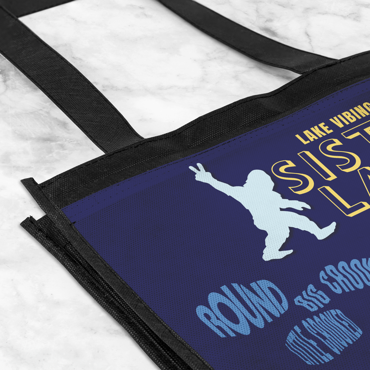 Sister_Lakes_Navy_Tote_GroceryTote_CloseUp_AS_Mockup.png