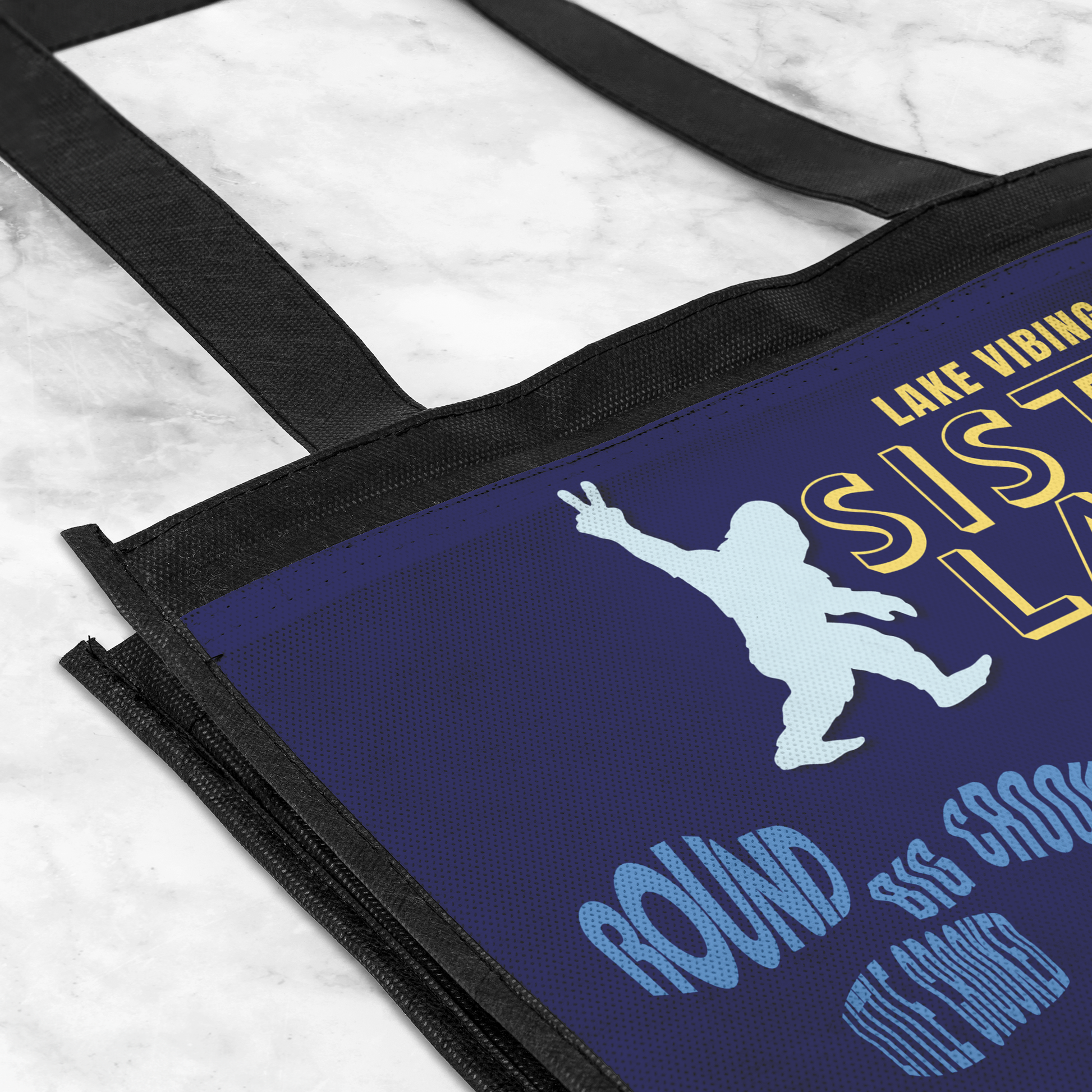 Sister_Lakes_Navy_Tote_GroceryTote_CloseUp_AS_Mockup.png
