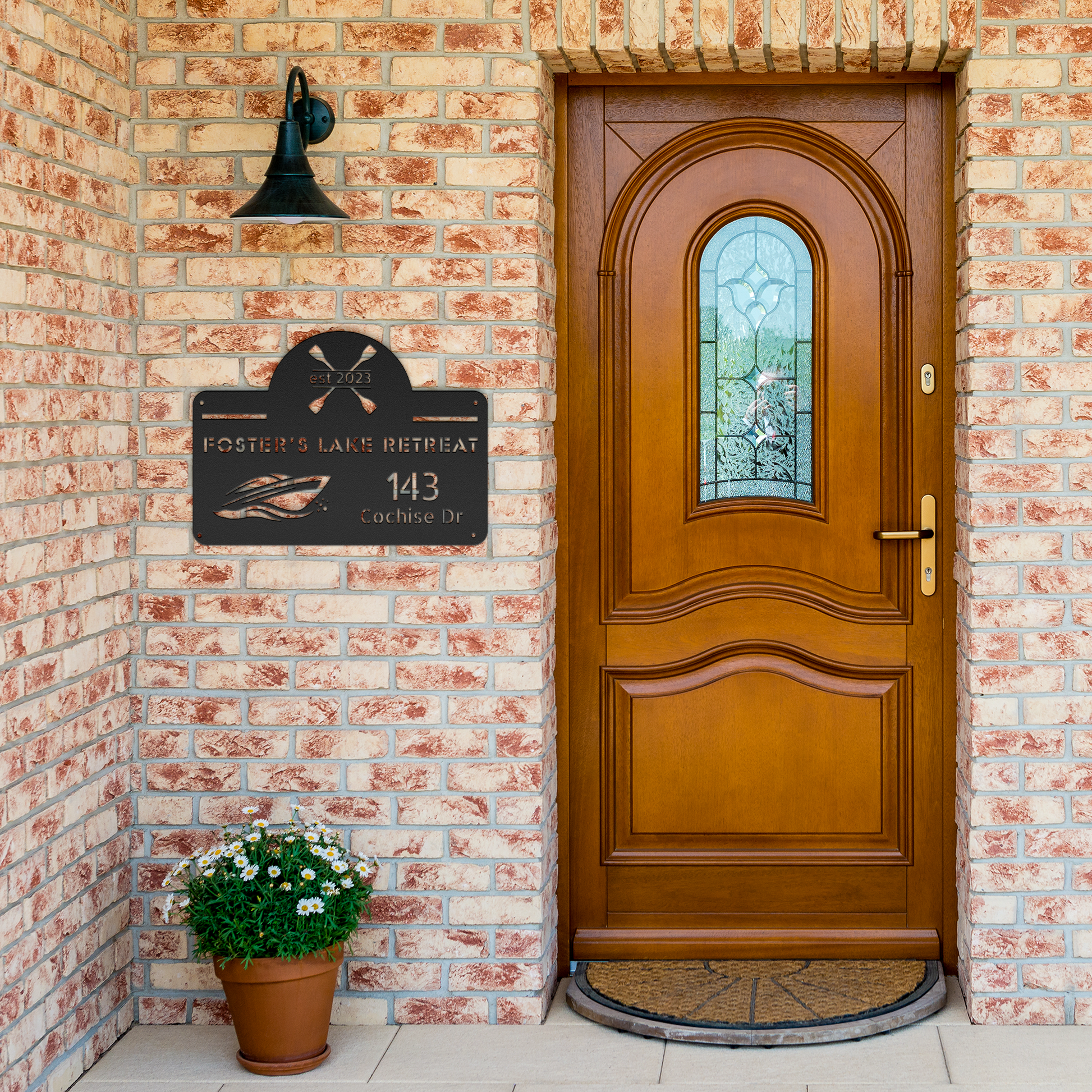 Fosters_Custom_Sign_Black_Brick_Entrance_Mockup.png